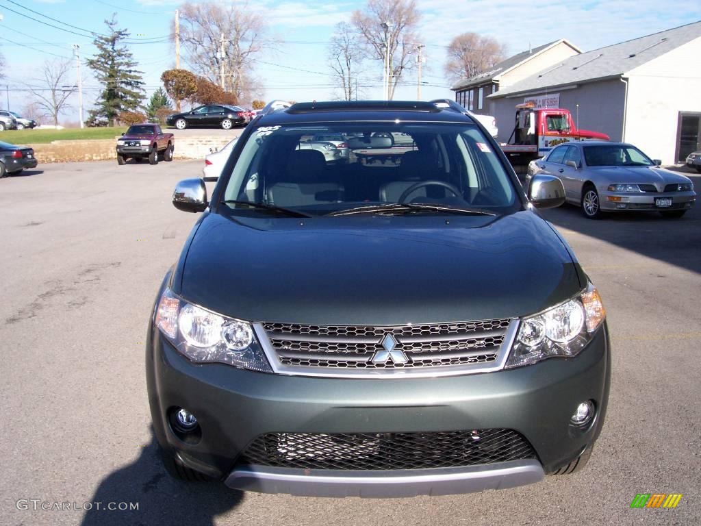 2009 Outlander SE 4WD - Manitoba Green Metallic / Black photo #8