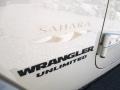 2011 Jeep Wrangler Unlimited Sahara 4x4 Badge and Logo Photo