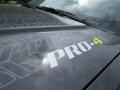 2014 Nissan Frontier Pro-4X Crew Cab 4x4 Badge and Logo Photo