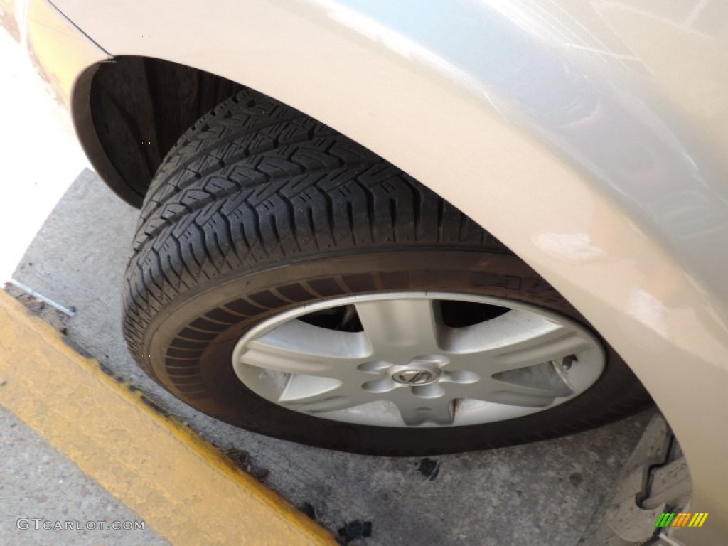 2006 Quest 3.5 S - Coral Sand Metallic / Beige photo #19