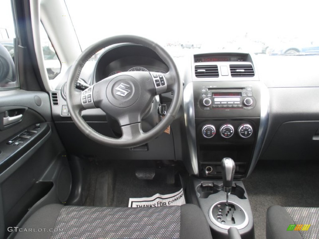 2008 SX4 Crossover Touring AWD - Cherry Red Metallic / Black photo #10