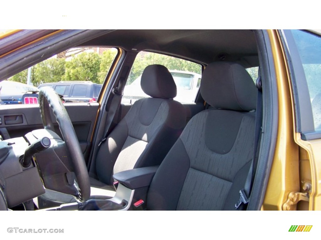 2009 Focus SE Sedan - Amber Gold Metallic / Charcoal Black photo #12