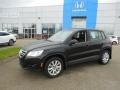 Deep Black Metallic 2010 Volkswagen Tiguan S 4Motion