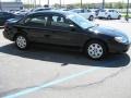 Black - Taurus SE Sedan Photo No. 4