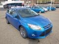 2014 Blue Candy Ford Focus SE Hatchback  photo #2