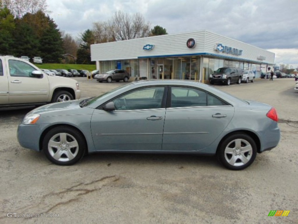 2009 G6 Sedan - Blue Gold Crystal Metallic / Ebony photo #2