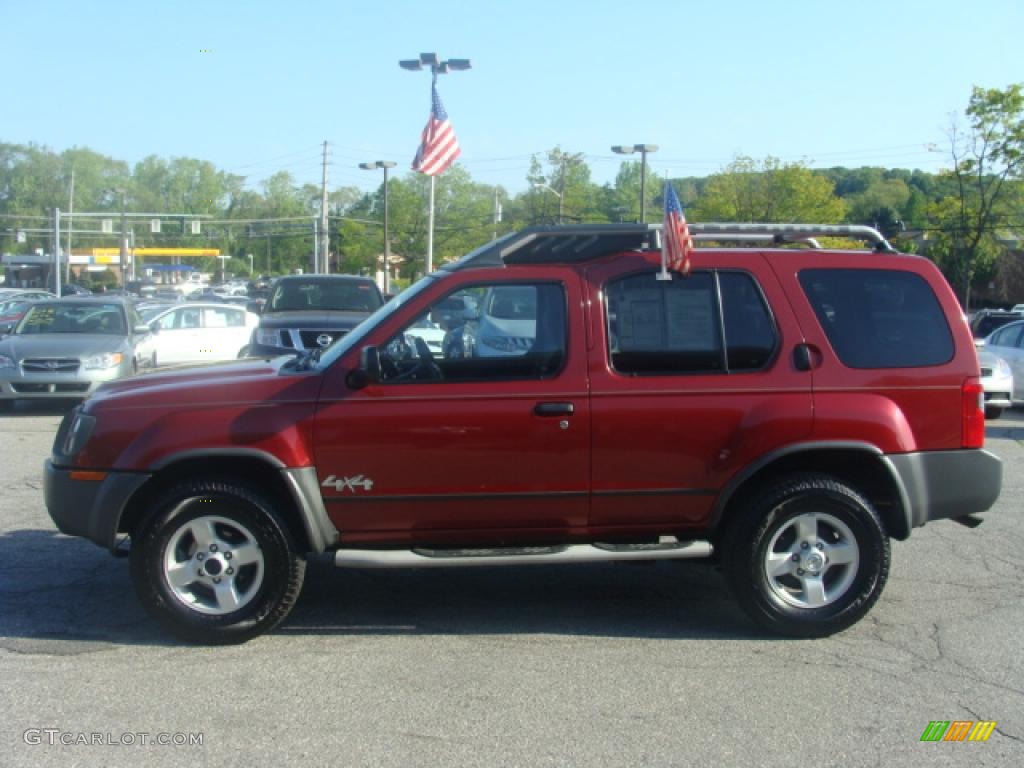 2004 Xterra SE 4x4 - Thermal Red Metallic / Gray photo #2