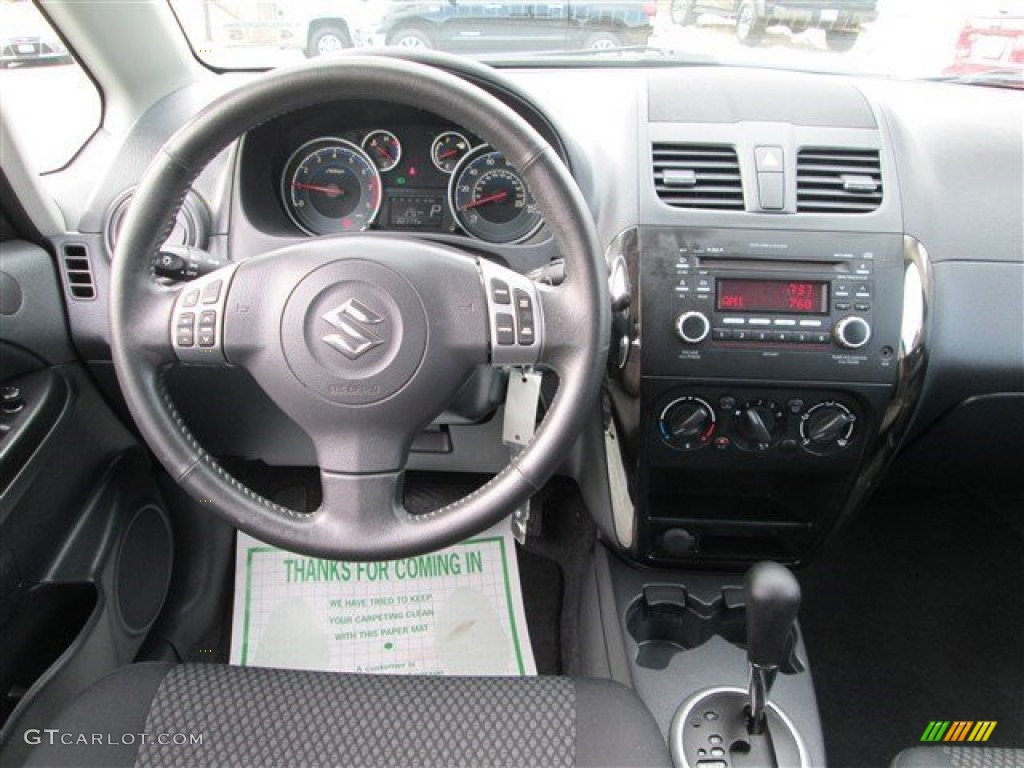 2013 SX4 Sedan LE Popular Package - Super Black Metallic / Black photo #11