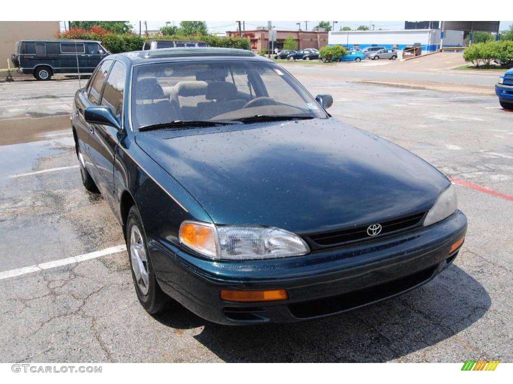 1995 Camry LE Sedan - Dark Emerald Green Metallic / Beige photo #1