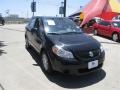 2013 Super Black Metallic Suzuki SX4 Sedan LE Popular Package  photo #11