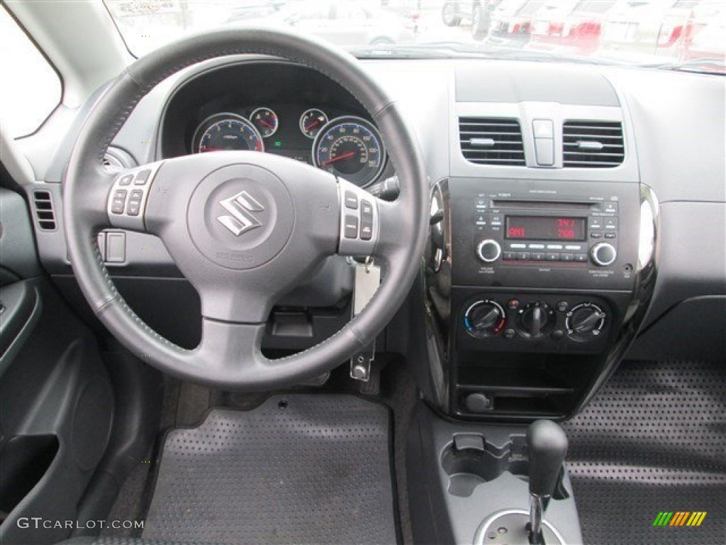 2013 SX4 Sedan LE Popular Package - Metallic Star Silver / Black photo #11