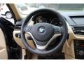 Beige 2014 BMW X1 xDrive28i Steering Wheel