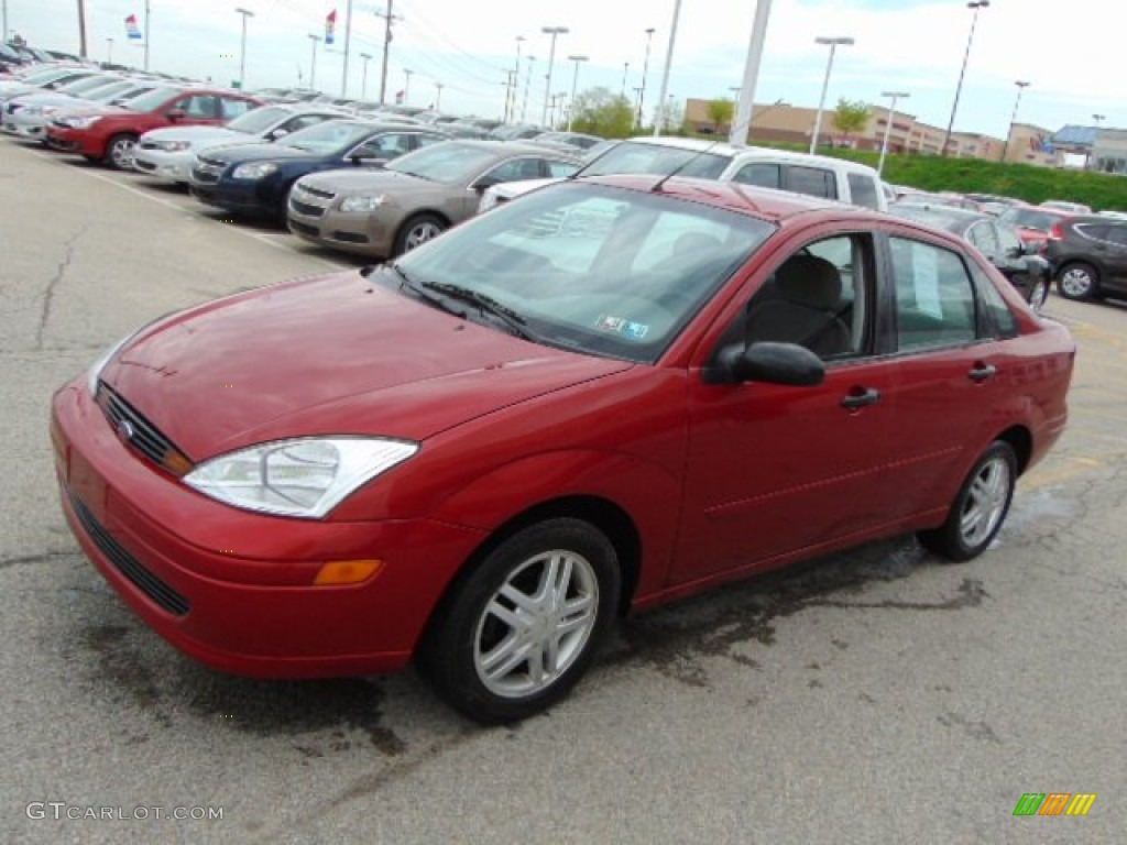 Sangria Red Metallic 2002 Ford Focus SE Sedan Exterior Photo #93530791