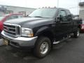 Black 2003 Ford F350 Super Duty Lariat SuperCab 4x4