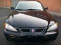 Black 1999 Pontiac Grand Am SE Sedan