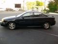 1999 Black Pontiac Grand Am SE Sedan  photo #2