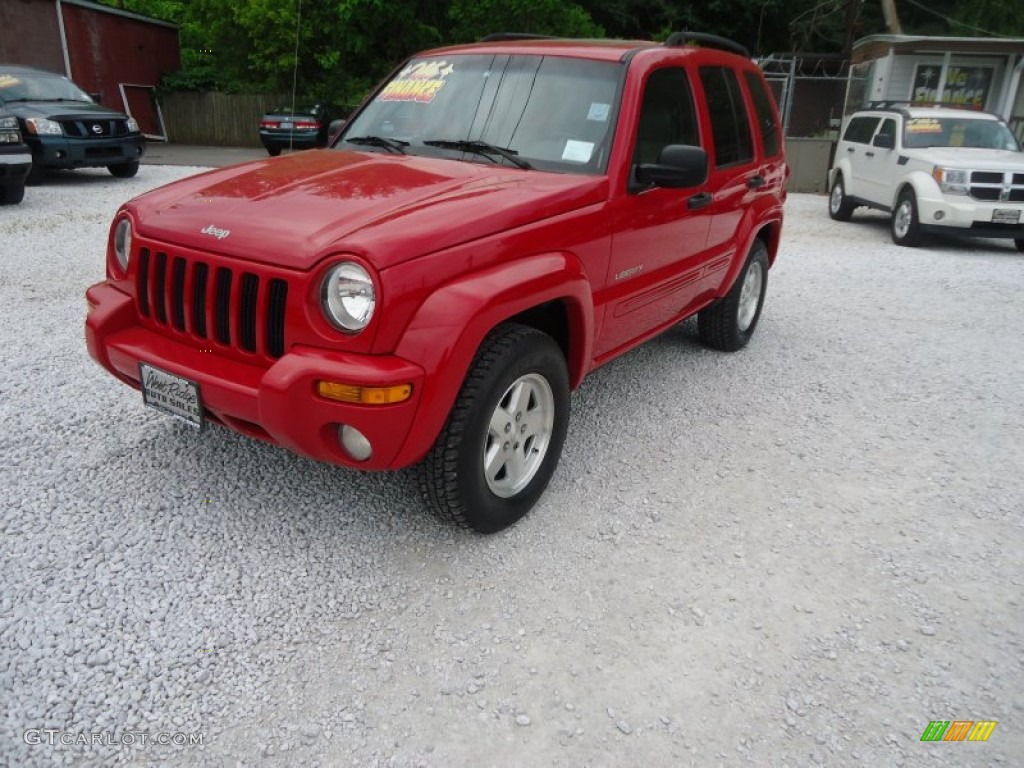 2004 Liberty Limited 4x4 - Flame Red / Light Taupe/Dark Slate Gray photo #1