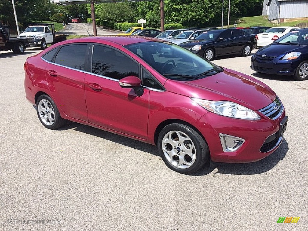 2011 Fiesta SEL Sedan - Bright Magenta Metallic / Plum/Charcoal Black Leather photo #1