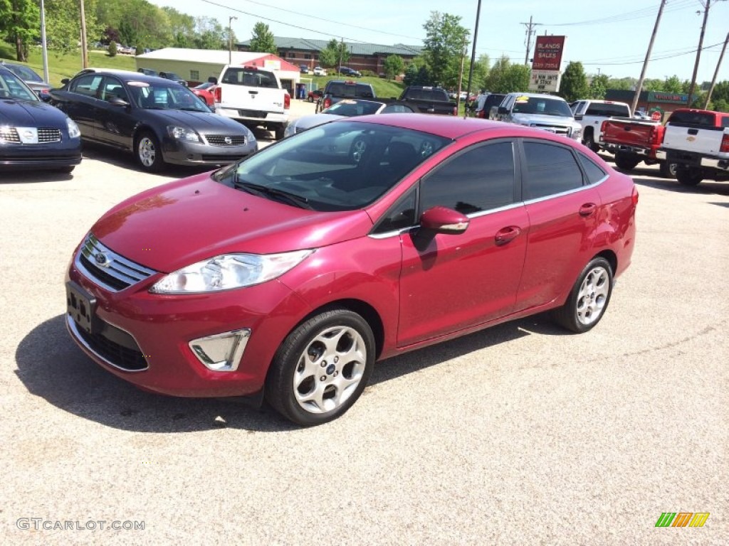 2011 Fiesta SEL Sedan - Bright Magenta Metallic / Plum/Charcoal Black Leather photo #9