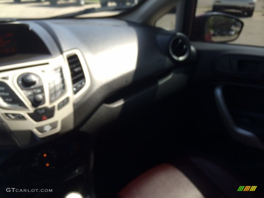 2011 Fiesta SEL Sedan - Bright Magenta Metallic / Plum/Charcoal Black Leather photo #20