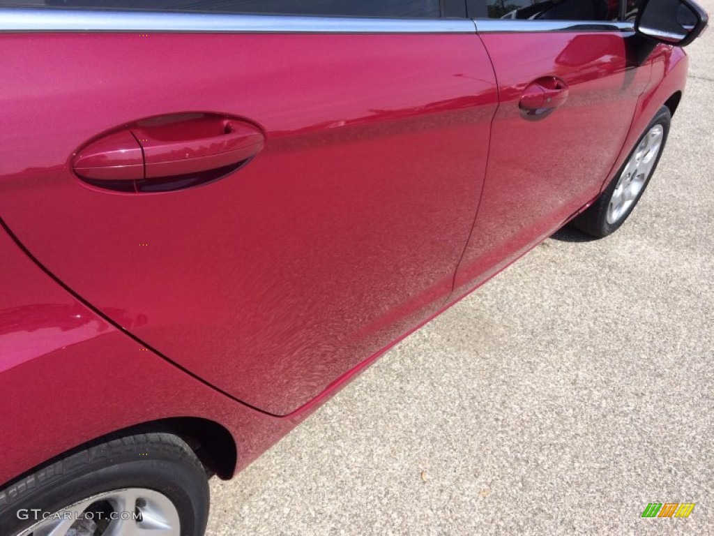 2011 Fiesta SEL Sedan - Bright Magenta Metallic / Plum/Charcoal Black Leather photo #22