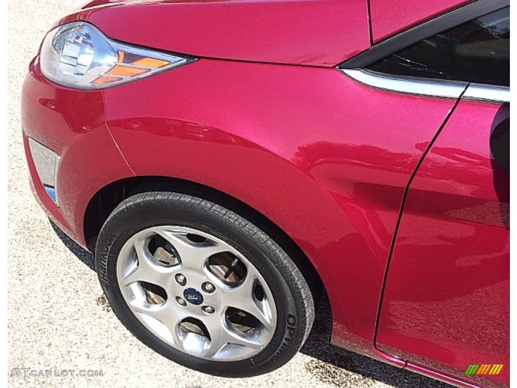 2011 Fiesta SEL Sedan - Bright Magenta Metallic / Plum/Charcoal Black Leather photo #26