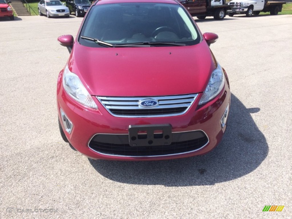 2011 Fiesta SEL Sedan - Bright Magenta Metallic / Plum/Charcoal Black Leather photo #37