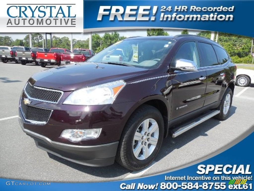 2010 Traverse LT - Dark Cherry Metallic / Dark Gray/Light Gray photo #1