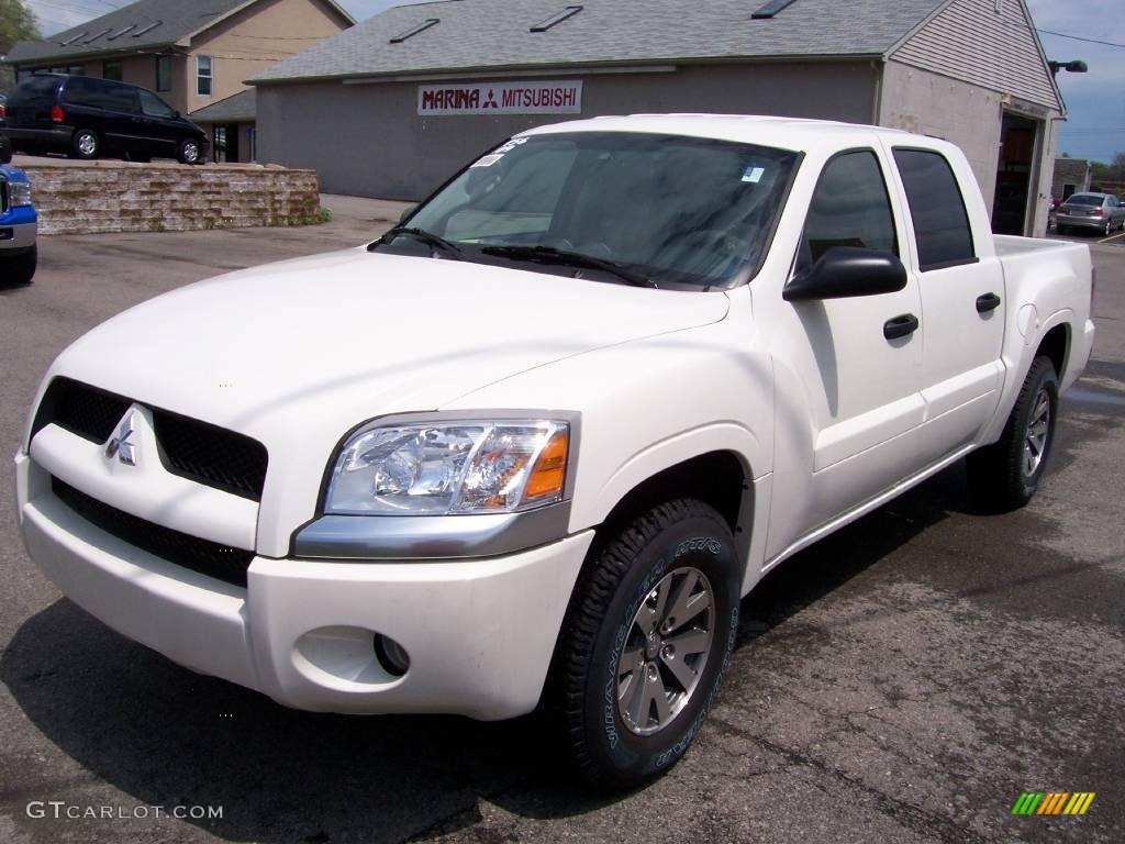 Yosemite White Mitsubishi Raider