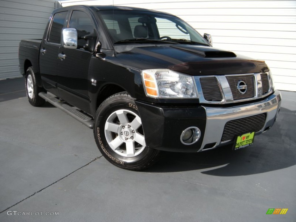 2004 Titan LE Crew Cab - Galaxy Black / Graphite/Titanium photo #1