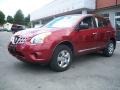 2011 Cayenne Red Nissan Rogue S AWD  photo #1