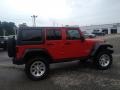 2012 Flame Red Jeep Wrangler Unlimited Sport 4x4  photo #10