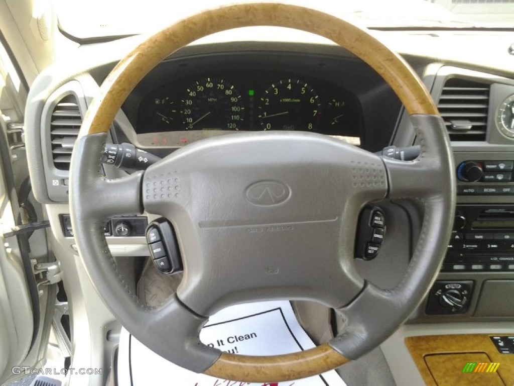 2001 QX4 4x4 - Tuscan Beige Metallic / Stone Beige photo #20