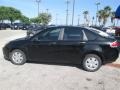 2011 Ebony Black Ford Focus S Sedan  photo #8