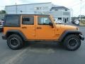 2012 Crush Orange Jeep Wrangler Unlimited Sport 4x4  photo #7