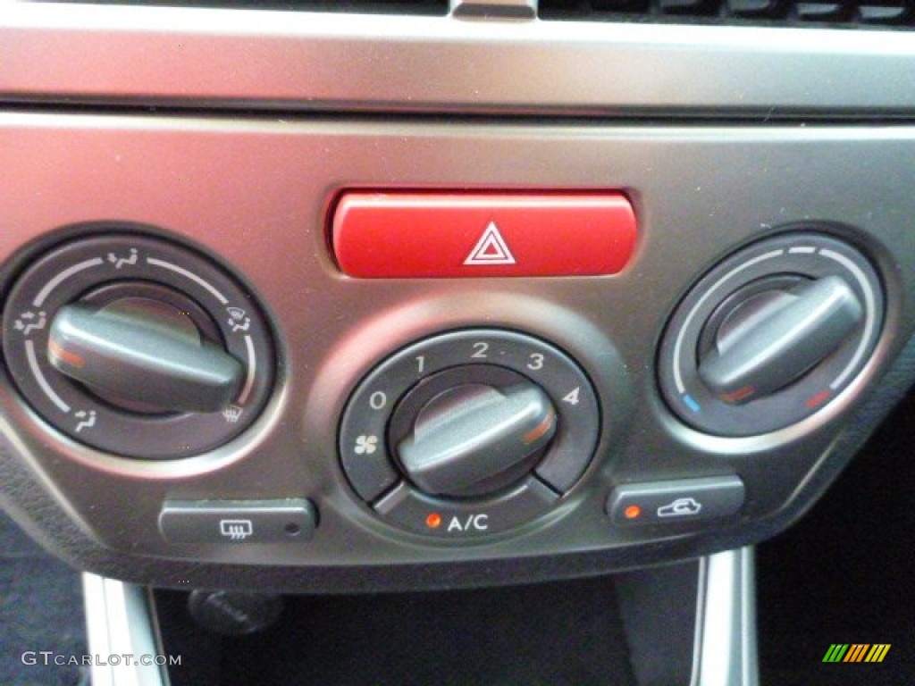 2010 Impreza 2.5i Sedan - Camellia Red Pearl / Carbon Black photo #19