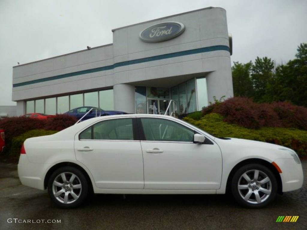 2010 Milan V6 Premier - White Suede / Camel photo #1