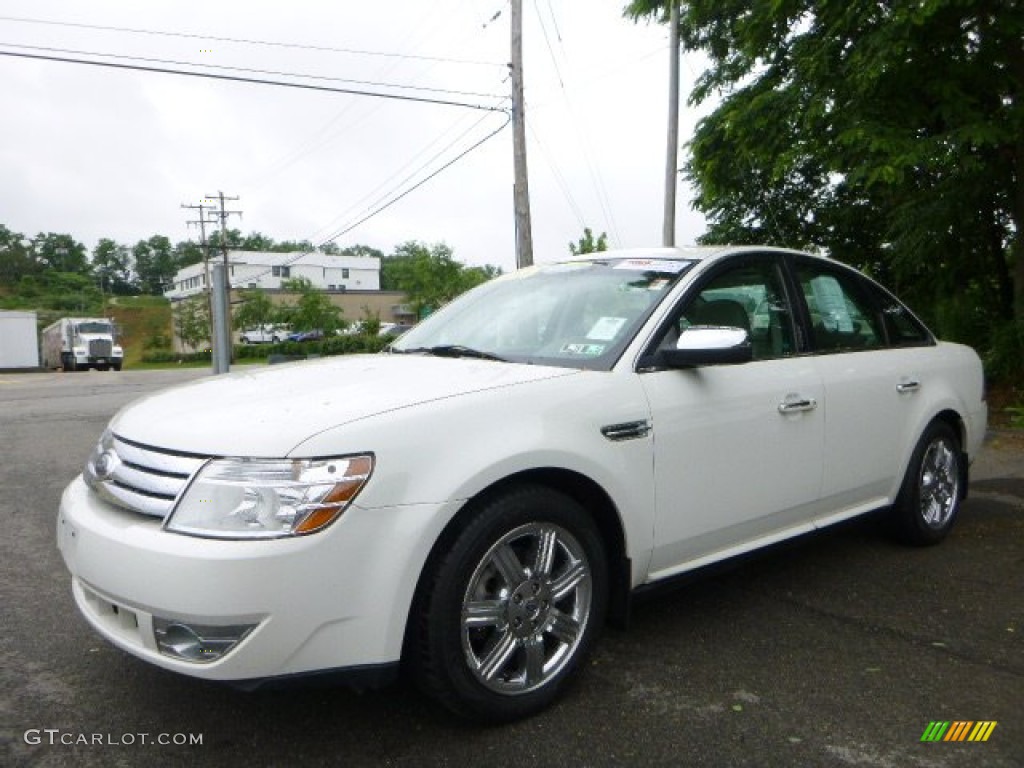 White Suede Ford Taurus