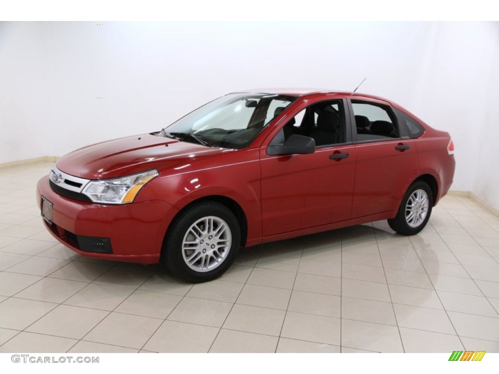 Sangria Red Metallic 2010 Ford Focus SE Sedan Exterior Photo #94708047