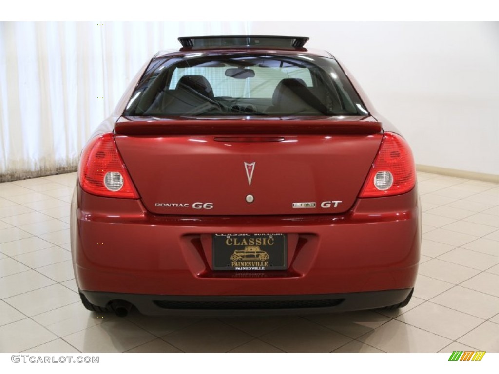 2010 G6 GT Sedan - Performance Red Metallic / Ebony photo #14