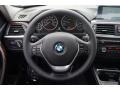 Black 2014 BMW 3 Series 328i Sedan Steering Wheel