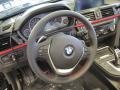 Black 2014 BMW 4 Series 428i xDrive Convertible Steering Wheel