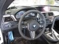 Black 2015 BMW M4 Coupe Dashboard