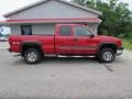 2003 Victory Red Chevrolet Silverado 2500HD LT Extended Cab 4x4  photo #2