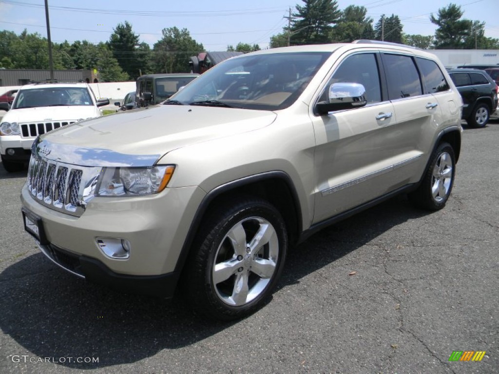 2012 Grand Cherokee Overland 4x4 - White Gold Metallic / New Saddle/Black photo #1