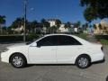 Super White - Camry LE Photo No. 2