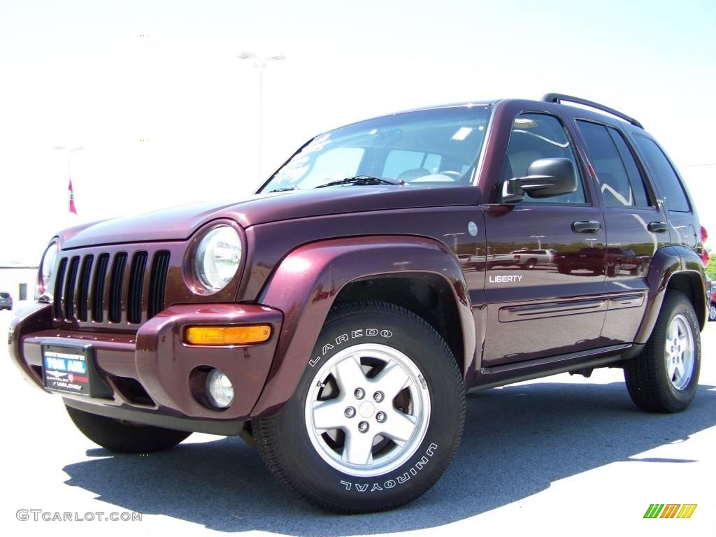 2004 Liberty Limited 4x4 - Deep Molten Red Pearl / Taupe photo #5