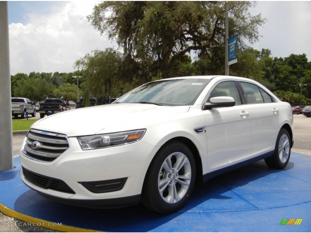 White Platinum Metallic Ford Taurus