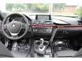 Black 2014 BMW 3 Series 320i xDrive Sedan Dashboard