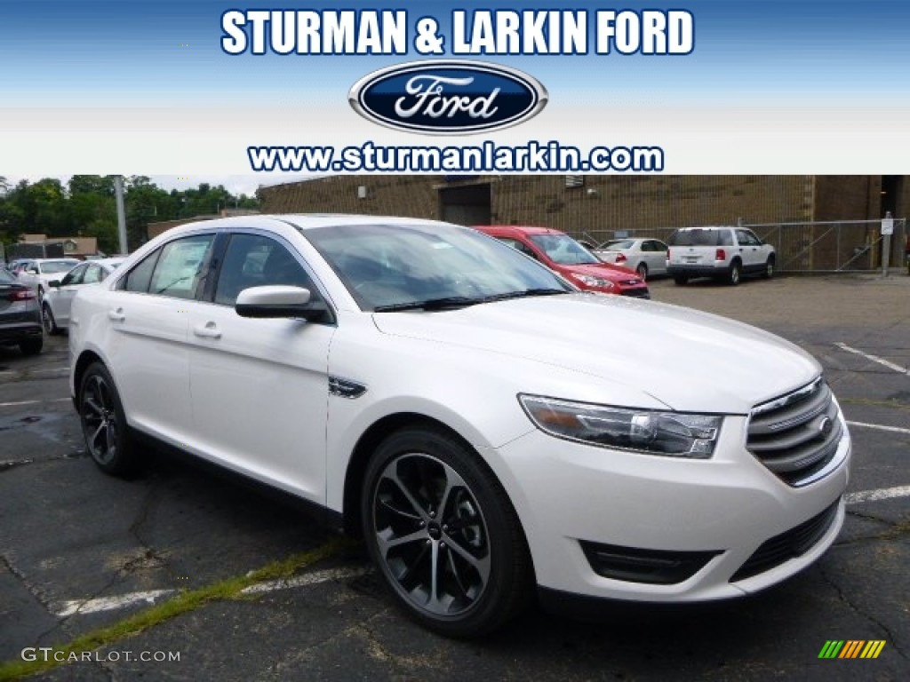 White Platinum Metallic Ford Taurus